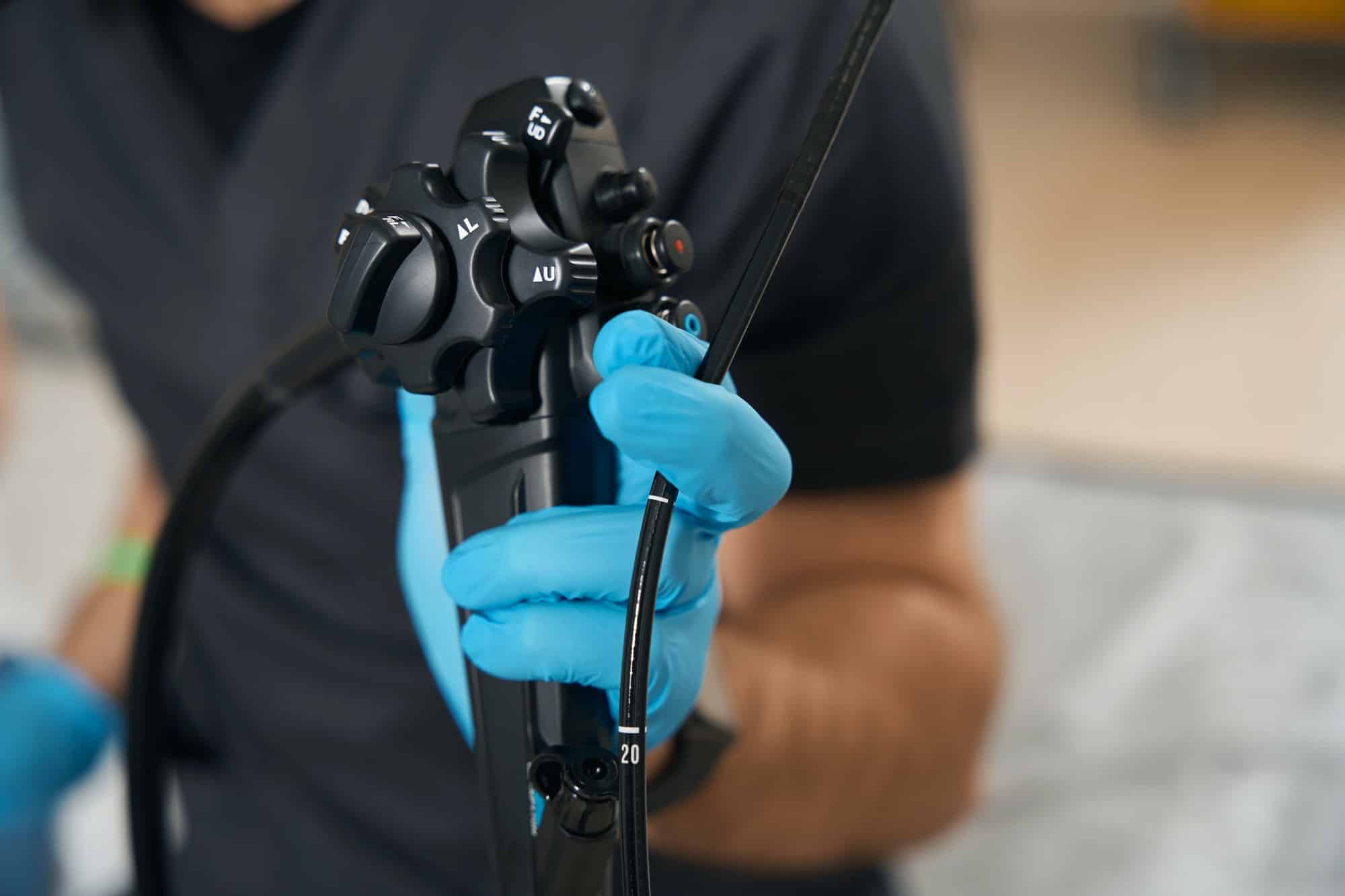 expert-diagnostician-demonstrating-endoscopic-equipment-before-endoscopy.jpg